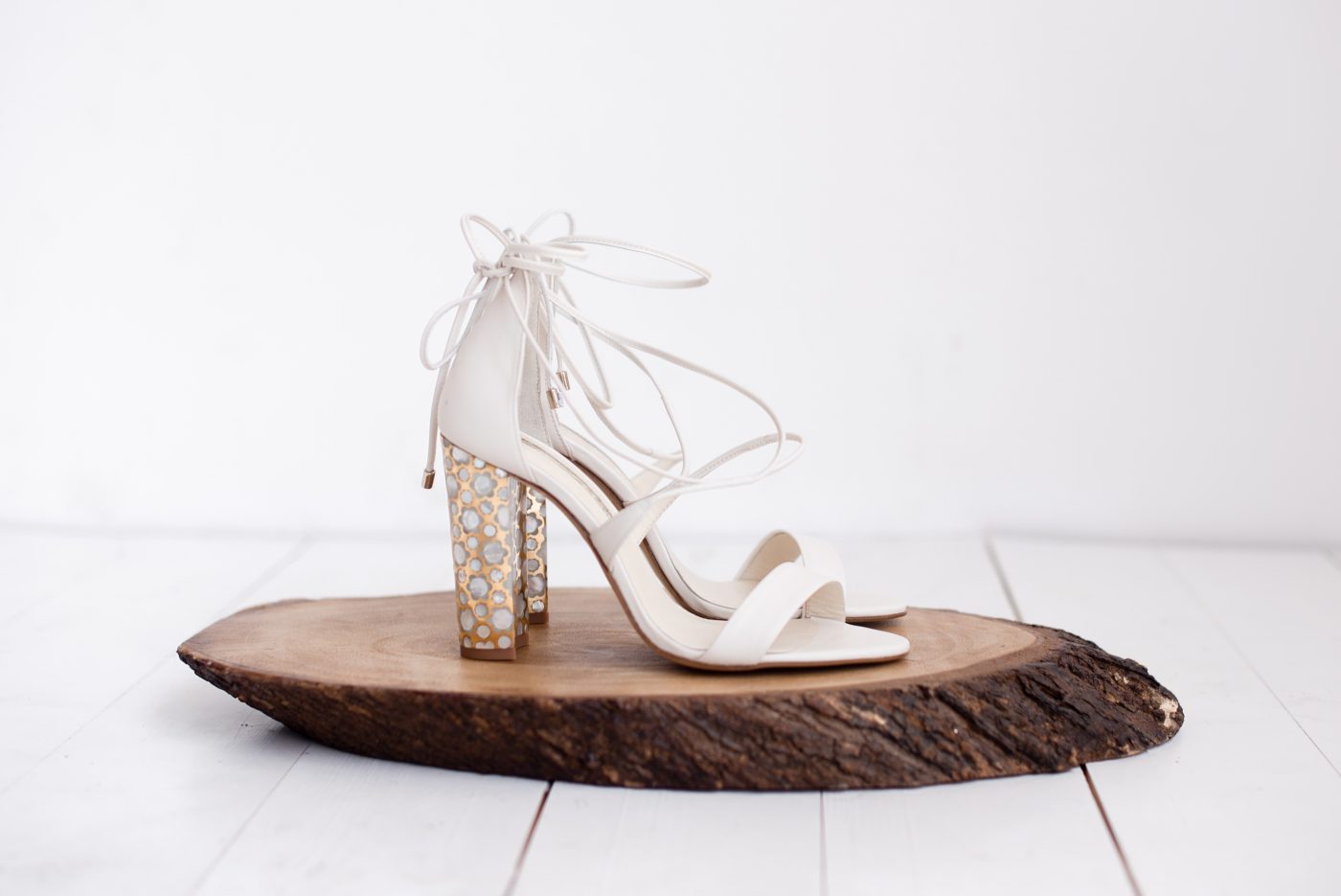 <a href="https://freyarose.com/collections/wedding-shoes/products/soraya-ivory" target="_blank" rel="noopener noreferrer">Soraya Ivory Sandal by Freya Rose</a> £695